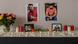 Candles, flowers, and photos on a table on display in a Kurdish cultural center in memory of Ferhat Unver, who was killed in a shooting in Hanau Candles, flowers, and photos on a table on display in a Kurdish cultural center in memory of Ferhat Unver, who was killed in a shooting in Hanau