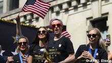 (FILES) In this file photo taken on July 10, 2019 Megan Rapinoe (C) and other members of the World Cup-winning US women's team take part in a ticker tape parade for the women's World Cup champions in New York. - US women's football players reached an impasse August 14, 2019, in mediation with the US Soccer Federation in their dispute over equal pay with the American men's squad. Molly Levinson, a spokesperson for the US women's players, said the group will eagerly look forward to a jury trial. (Photo by Johannes EISELE / AFP)
