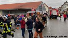 People react at the scene after a car ploughed into a carnival parade injuring several people in Volkmarsen, Germany February 24, 2020. Elmar Schulten/Waldeckische Landeszeitung via REUTERS. NO RESALES. NO ARCHIVES
