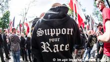 May 25, 2019 - Dortmund, Nordrhein Westfalen, Germany - Support your race worn by a neonazi at an event in Dortmund, Germany. Prior to the European Elections, the neonazi party Die Rechte (The Right) organized a rally in the German city of Dortmund to promote their candidate, the incarcerated Holocaust denier Ursula Haverbeck. The demonstration and march were organized by prominent local political figure and neonazi activist Michael Brueck (Michael BroÂ¼ck) who enlisted the help of not only German neonazis, but also assistance from Russian, Bulgarian, Hungarian, and Dutch groups with the final tally ranging from 180-250. The police reported various incidents, including forbidding the use of a banner with former President of Iran Ahmadenijad, who the group states is an ally. Later, the parade was stopped due to the use of Ã¢â‚¬oeh PUBLICATIONxINxGERxSUIxAUTxONLY - ZUMAb160 20190525_zbp_b160_093 Copyright: xSachellexBabbarx