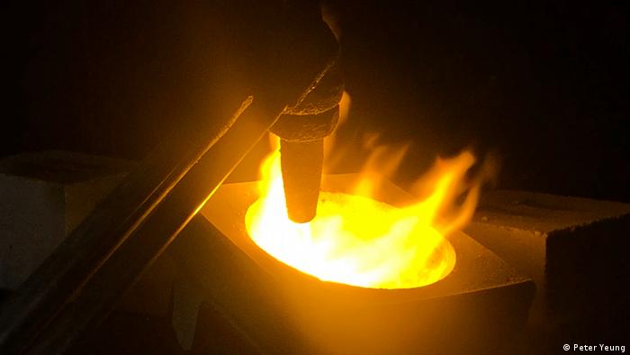Gold being smelted in one of the many shops in Creporizao, Brazil 