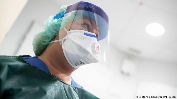 A doctor wears protective gear at a hospital in Essen, Germany