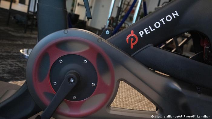 A file photo shows the Peloton logo on the company's stationary bicycle