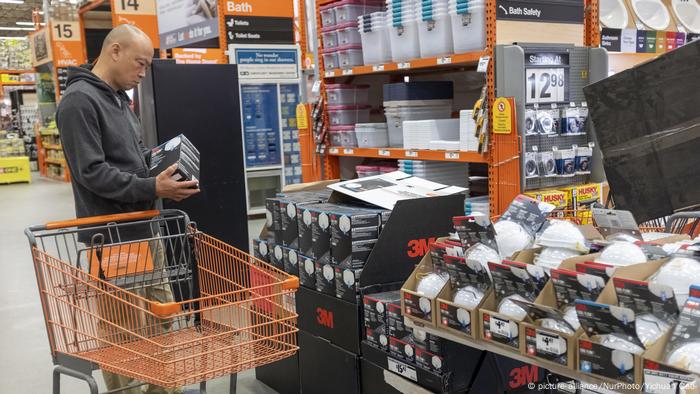 A customer shops for 3M N95 particulate filtering face mask at a store in East Palo Alto, California