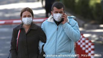 Люди в масках в Тбилиси