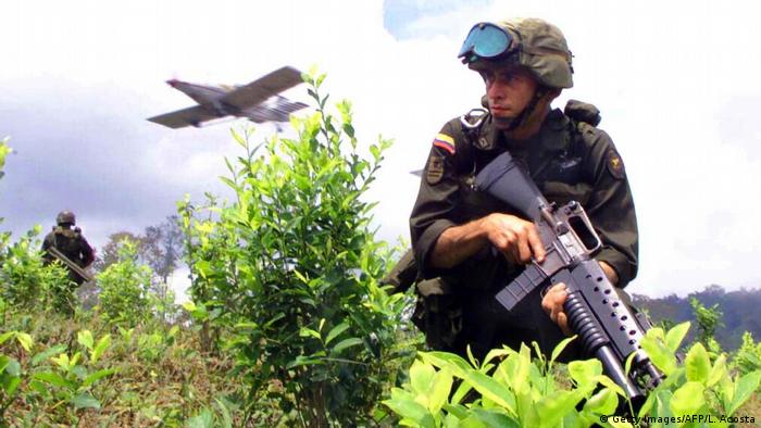 A plane spraying glyphosate on coca fields in Colombia