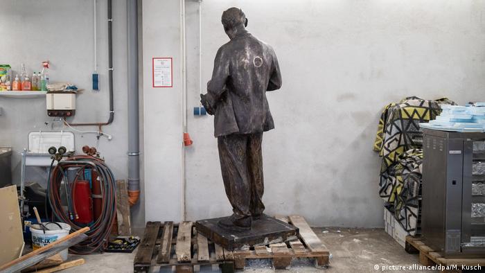 The Lenin statue pictured in storage, before it is put on show.