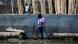 A schoolchild in Beira, Mozambique, walking across a flooded schoolyard A schoolchild in Beira, Mozambique, walking across a flooded schoolyard