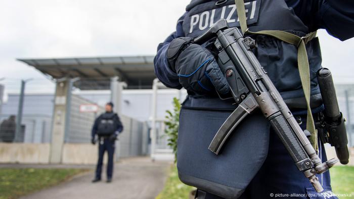 Police outside the higher regional court in Düsseldorf