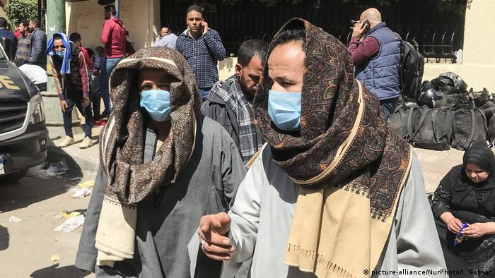 People wearing a protective mask in Cairo