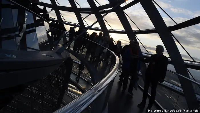 People visit the dome of the Reichstag building in Berlin