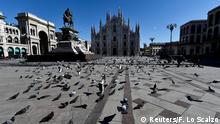 FILE PHOTO: A view of the Duomo square on the second day of an unprecedented lockdown across all of the country, imposed to slow the outbreak of coronavirus, in Milan, Italy March 11, 2020. REUTERS/Flavio Lo Scalzo/File Photo