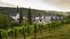 A view of the Eberbach Abbey and surrounding vineyards A view of the Eberbach Abbey and surrounding vineyards