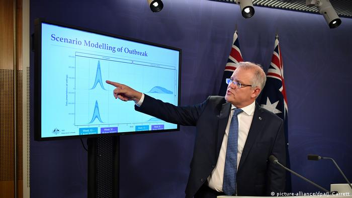 Australien | Coronavirus: Premierminister Scott Morrison auf Pressekonferenz (picture-alliance/dpa/J. Carrett)