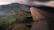 An airplane wing is seen over Quito, Ecuador An airplane wing is seen over Quito, Ecuador