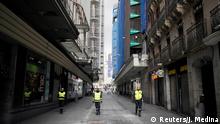 Members of the Military Emergency Unit (UME) patrol during partial lockdown as part of a 15-day state of emergency to combat the coronavirus disease outbreak in Madrid, Spain March 16, 2020. REUTERS/Juan Medina