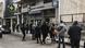 Customers wait in a queue to receive a card to allow them to ender in a bank in Athens Customers wait in a queue to receive a card to allow them to ender in a bank in Athens