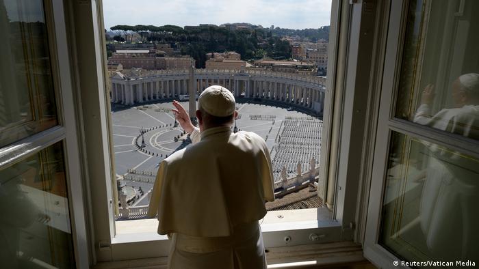 Pope Francis sends a virtual hug after delivering his weekly Angelus prayer via video at the Vatican