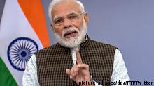ARCHIV - 09.11.2019, Indien, Neu Delhi: Narendra Modi, Premierminister von Indien, . ndien hat seine Ausgangssperren während der Corona-Pandemie auf 32 der 36 Bundesstaaten und Bundesterritorien ausgeweitet. Das teilte die Regierung am Dienstag auf Twitter mit. (zu dpa: «Indien weitet Ausgangssperren aus - Modi wendet sich an die Nation») Foto: Twitter/PTI/dpa +++ dpa-Bildfunk +++