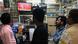 India's watch TV in a shop India's watch TV in a shop