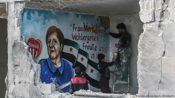 BdTD Syrien Binnish Wandgemälde für Merkel in Ruine (picture-alliance/dpa/A. Alkharboutli)