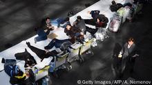 Citizens of Central Asian countries, who are stuck in Moscow after ex-Soviet states closed borders and stopped flights over the coronavirus pandemic, wait for flights to get back home at Moscow