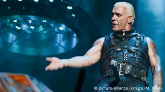 Till Lindemann, singer of the band Rammstein, performing in leather bondage gear at the Wacken Open Air festival in 2013