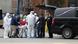 Workers load the body of a deceased person into a waiting hearse vehicle outside The Brooklyn Hospital Center Workers load the body of a deceased person into a waiting hearse vehicle outside The Brooklyn Hospital Center