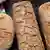 Three fresh loaves of bread, including a sourdough boule, by the author, Zulfikar Abbany