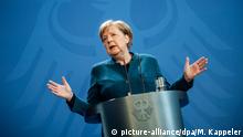 ARCHIV - 22.03.2020, Berlin: Bundeskanzlerin Angela Merkel (CDU), spricht bei einer Pressekonferenz nach einer Telefonkonferenz mit den Ministerpräsidenten der Länder über weitere Maßnahmen gegen die Ausbreitung des Coronavirus. (zu dpa: Merkel gegen Corona-Bonds - «ESM Mittel zur Krisenbewältigung») Foto: Michael Kappeler/dpa-pool/dpa +++ dpa-Bildfunk +++ | Verwendung weltweit