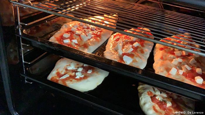 Home-made calzones in an oven