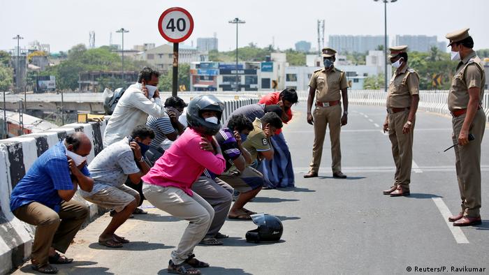 People doing exercises as punishment for breaking lockdown in Chennai, India (Reuters/P. Ravikumar)