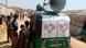 A rickshaw brings the information about the coronavirus to the people in the camp via loudspeaker