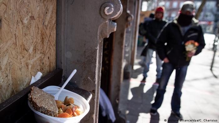 homeless people receiving free food in Hamburg