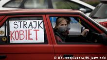 14.04.2020 *** Women drive their car with a Women's Strike banner in protest against the Polish Parliament to debate new limits on abortion and sexual education in Warsaw, Poland April 14,2020. Human Rights Watch, one of the world's largest human rights groupings accused the Polish government of taking advantage of the coronavirus disease (COVID-19) outbreak lockdown to debate new abortion laws. Maciek Jazwiecki/Agencja Gazeta via REUTERS ATTENTION EDITORS - THIS IMAGE WAS PROVIDED BY A THIRD PARTY. POLAND OUT. NO COMMERCIAL OR EDITORIAL SALES IN POLAND. TPX IMAGES OF THE DAY
