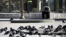 A homeless man sits at a square during a government-ordered lockdown to curb the spread of the new coronavirus in Buenos Aires, Argentina, Tuesday, April 14, 2020. (AP Photo/Natacha Pisarenko) |
