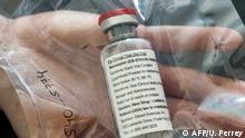 One vial of the drug Remdesivir lies during a press conference about the start of a study with the Ebola drug Remdesivir in particularly severely ill patients at the University Hospital Eppendorf (UKE) in Hamburg, northern Germany on April 8, 2020, amidst the new coronavirus COVID-19 pandemic. (Photo by Ulrich Perrey / POOL / AFP)