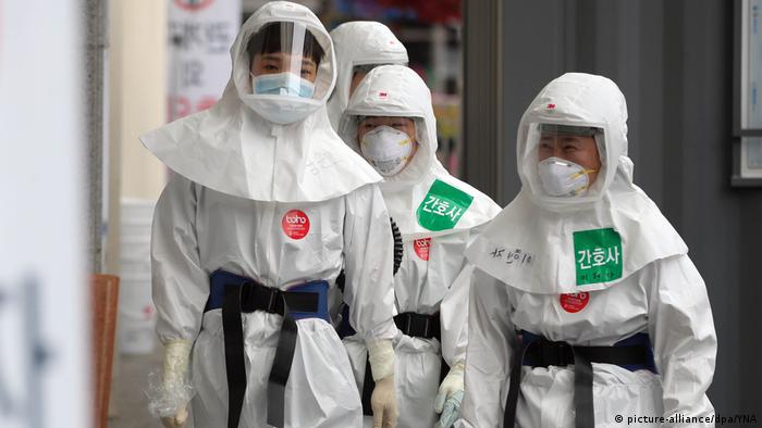 South korean health workers in PPE