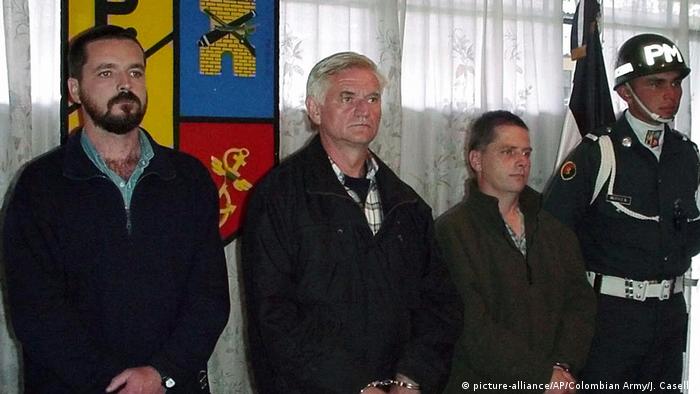 An August 13, 2001 file photo showing, from left to right, Niall Connolly, James Monaghan and Martin McCauley They were being presented to the media after their initial arrest, three years before their eventual convictions