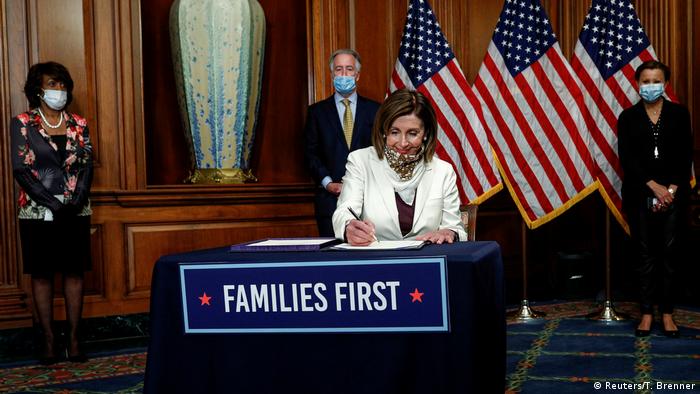 U.S. Speaker of the House Nancy Pelosi (D-CA) signs H.R. 266, the Paycheck Protection Program Healthcare Enhancement