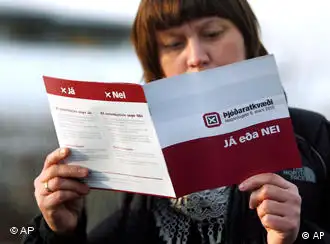 An Icelander reads a referendum pamphlet in Reykjavik on Tuesday March 2, 2010