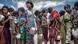 Rohingya refugee children queue for food in a camp in Cox's Bazar, Bangladesh Rohingya refugee children queue for food in a camp in Cox's Bazar, Bangladesh