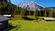 Mountain meadow with chalets and peaks in the background, Bavaria Mountain meadow with chalets and peaks in the background, Bavaria