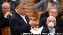 23.03.2020 *** FILE - In this March 23, 2020, file photo, Hungarian Prime Minister Viktor Orban delivers his speech about the current state of the coronavirus outbreak during a plenary session in the House of Parliament in Budapest, Hungary. Prime Minister Orban may have been the most adroit at exploiting the health crisis. His country’s Parliament granted him the power to rule indefinitely by decree, unencumbered by existing laws or judicial or parliamentary restraints. One aspect of the law ostensibly passed to cope with the coronavirus calls for prison terms of up to five years for those convicted of spreading falsehoods or distorted facts during the emergency. (Tamas Kovacs/MTI via AP, File) |
