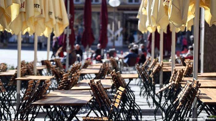 Empty chairs and tables are seen in front of a restaurant during the spread of the coronavirus disease (COVID-19) in Munich