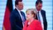 Angela Merkel, canciller de Alemania, y al fondo, el ministro alemán de Salud, Jens Spahn y el director del Instituto Robert Koch (IRK). Angela Merkel, canciller de Alemania, y al fondo, el ministro alemán de Salud, Jens Spahn y el director del Instituto Robert Koch (IRK).