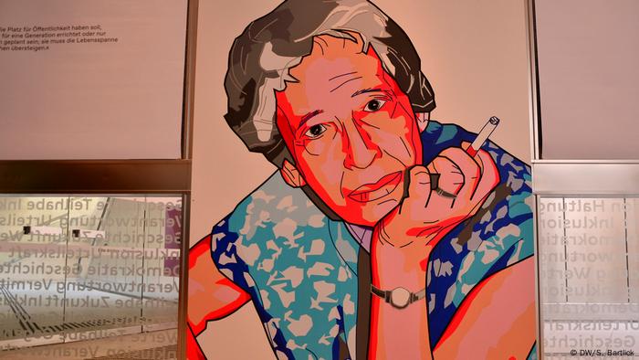 A colorful illustration of Hannah Arendt at a previous exhibition. A colorful illustration of Hannah Arendt at a previous exhibition.