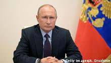 Russian President Vladimir Putin chairs a meeting on planning for a withdrawal from virus lockdown via a video link at the Novo-Ogaryovo state residence outside Moscow on May 6, 2020. (Photo by Alexey DRUZHININ / SPUTNIK / AFP) (Photo by ALEXEY DRUZHININ/SPUTNIK/AFP via Getty Images)