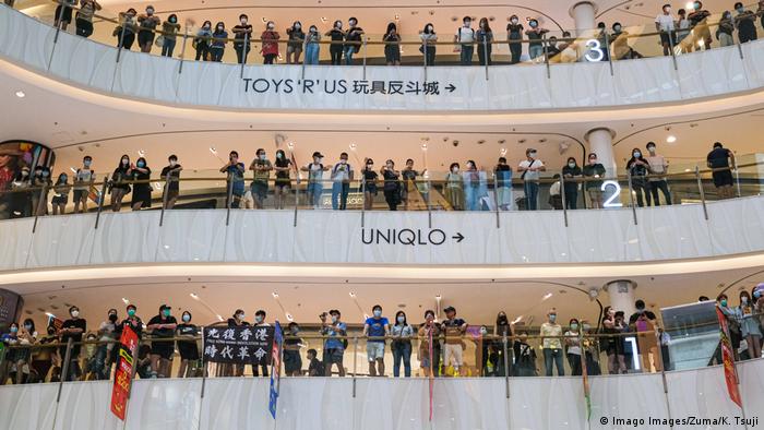 A flash mob anti-government protest in a Hong Kong mall