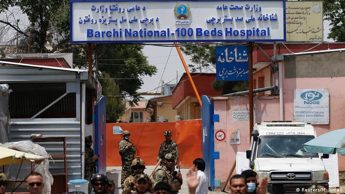 Afghan security forces stand guard outside Dasht-e-Barchi Hospital in Kabul
